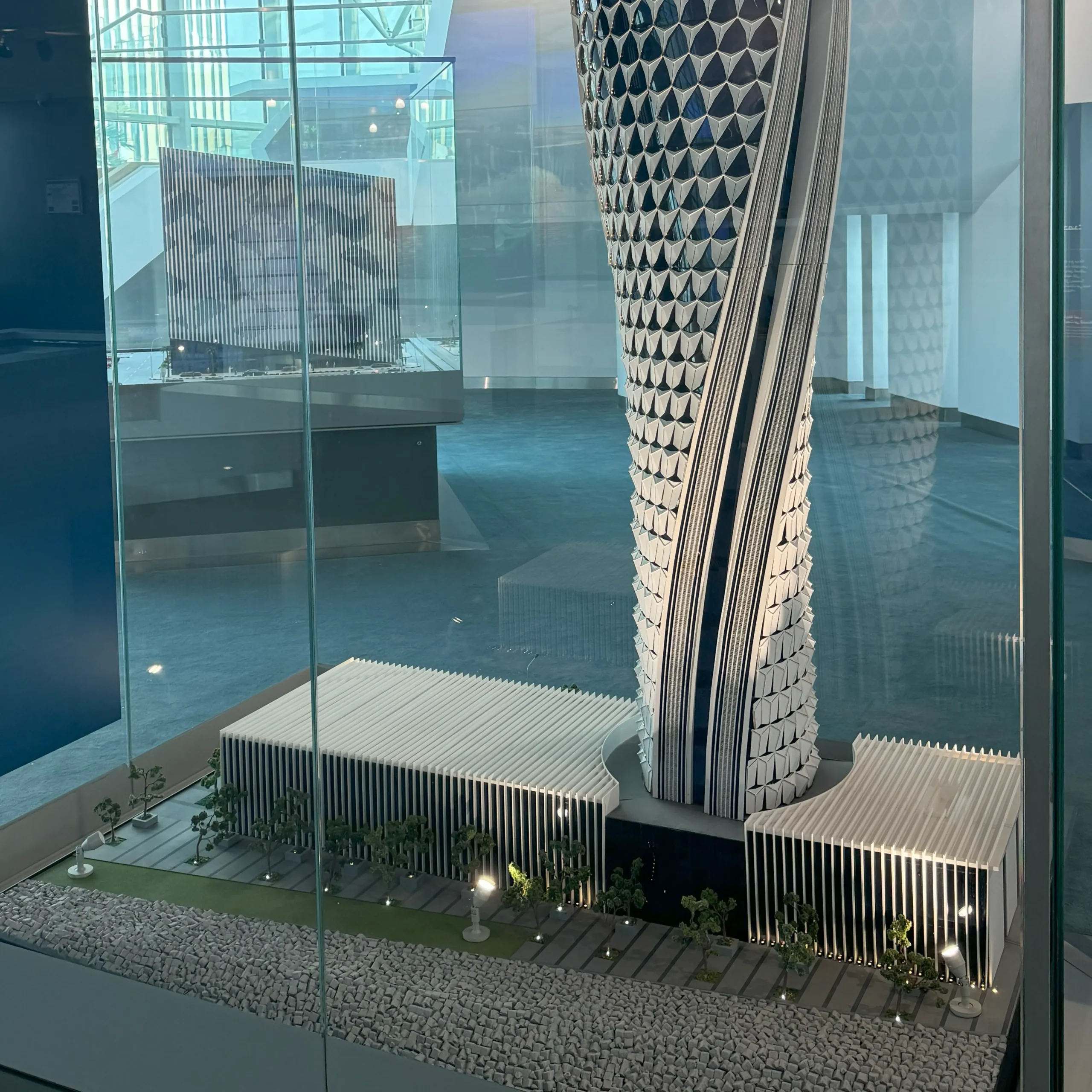 Detailed Architecture scale model of Hamad Port's Control Tower with detailed Facade with intricate hexagonal details.